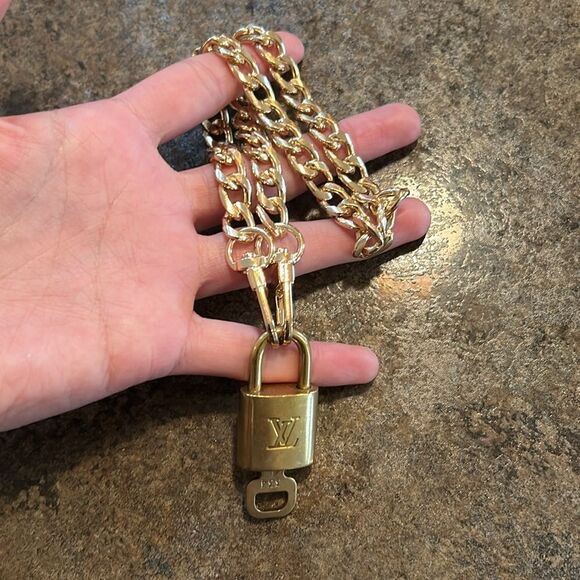 Louis Vuitton Other - Louis Vuitton #334 Lock and Key Gold Brass with new unbranded chain